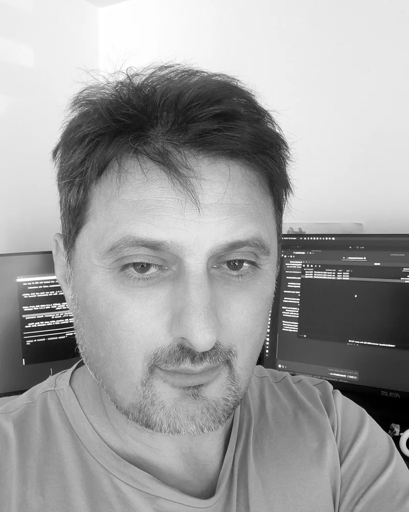 Zoran, founder of WEBLAB, at his desk
